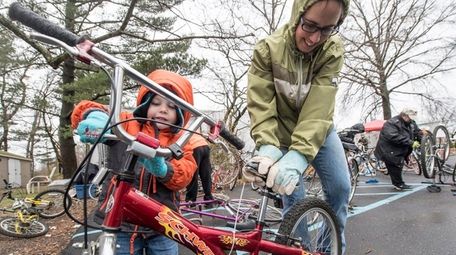Christina Gasiewski with her son, Mason, 3, prepare