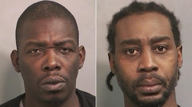 Robert Johnson, left, of Manhattan, left, and John