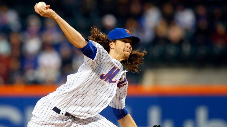 Jacob deGrom of the Mets pitches in the