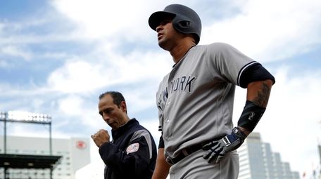 New York Yankees' Gary Sanchez walks off the