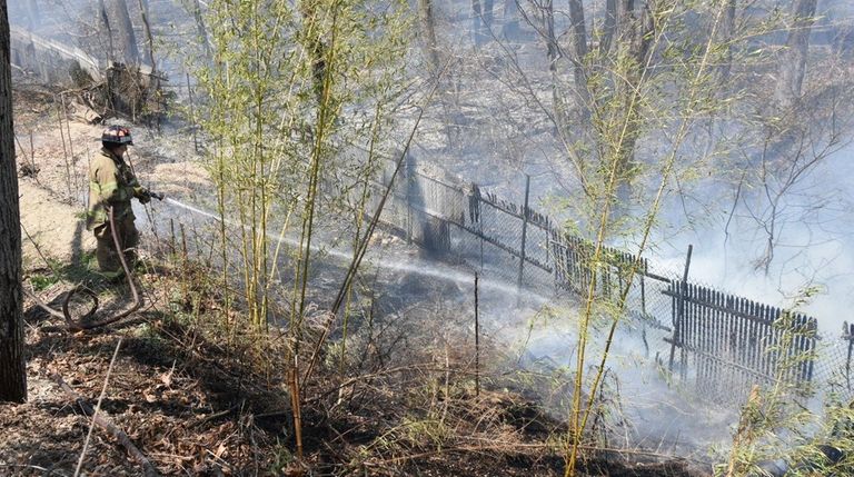 A Melville firefighter suffered a shoulder injury Sunday,