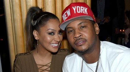 La La Anthony, left, and Carmelo Anthony got