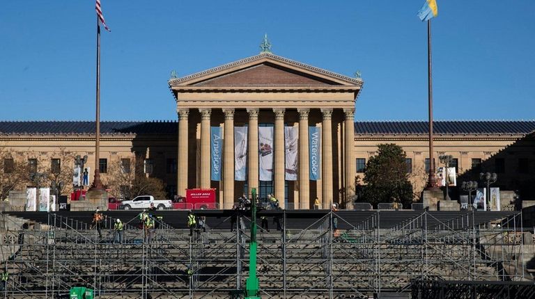 Workmen construct the stage for the upcoming 2017