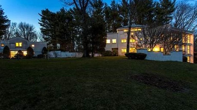 The four-bedroom Colonial main house of the Upper