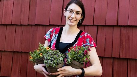 Millennial gardener Victoria Ferremi, a student at Farmingdale