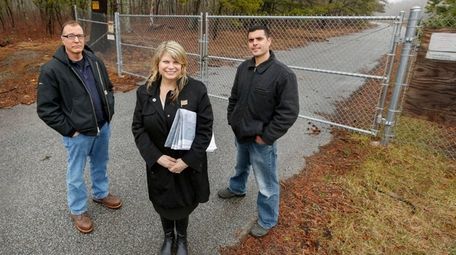 Riverhead Town engineer Drew Dillingham, left, Councilwoman Jodi