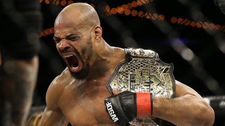 David Branch celebrates his submission win over Louis