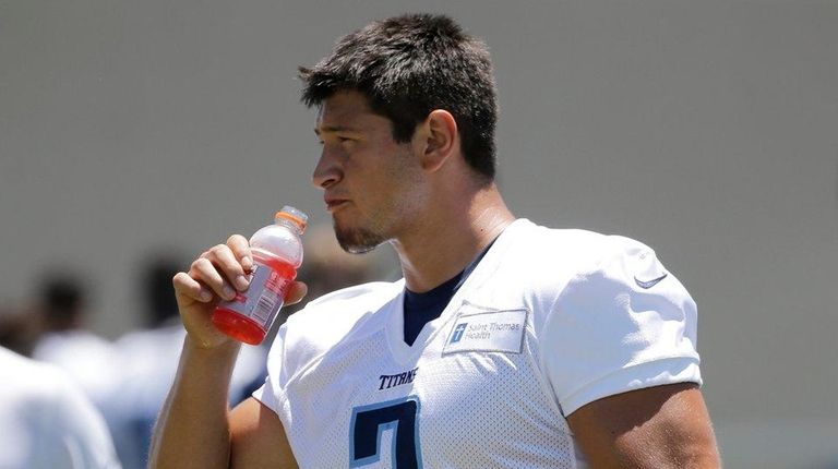 Tennessee Titans kicker Aldrick Rosas walks off the