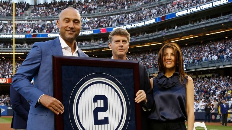 Retired New York Yankees shortstop Derek Jeter poses