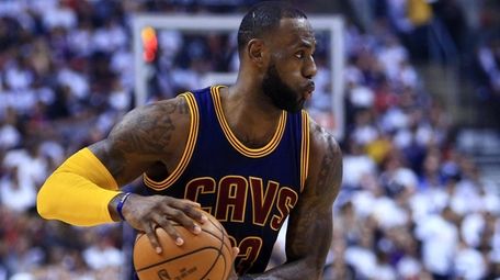 Lebron James #23 of the Cleveland Cavaliers dribbles