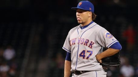 Relief pitcher Hansel Robles #47 of the New
