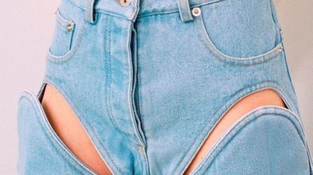 Designed by Y/Project, these bleached denim cutout jeans,