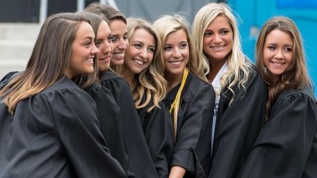 Graduates pose at St. Joseph's College's 98th commencement