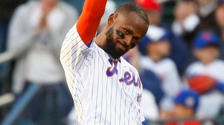 Jose Reyes of the New York Mets acknowledges the