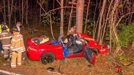 Firefighters at the scene of a crash in