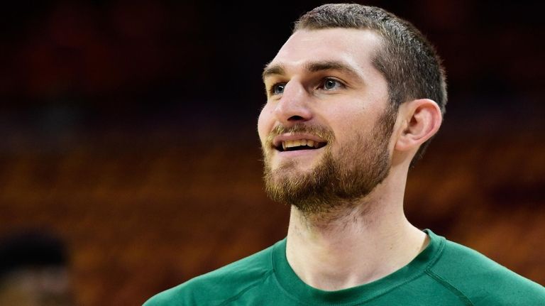 Tyler Zeller of the Celtics warms up prior