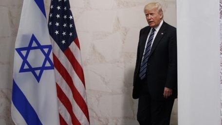 President Donald Trump arrives to deliver a speech