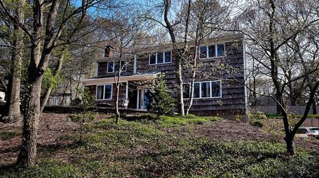 The four-bedroom house in Port Jefferson is listed