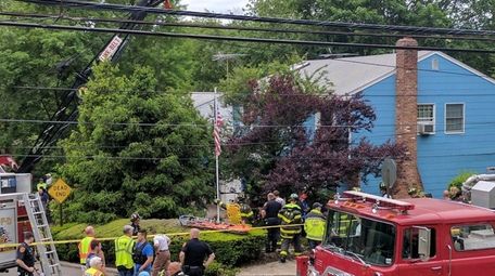 Emergency responders work to free a man from