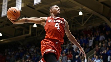 North Carolina State's Dennis Smith Jr. drives to the