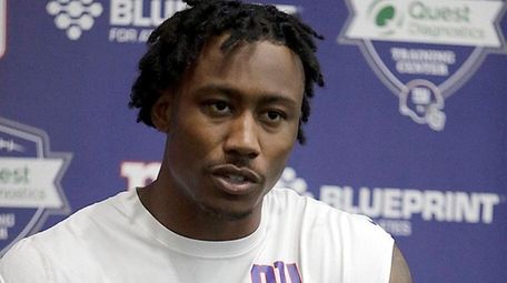 Giants wide receiver Brandon Marshall speaks to the