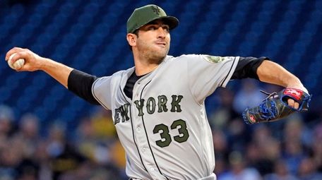 New York Mets' Matt Harvey delivers in the