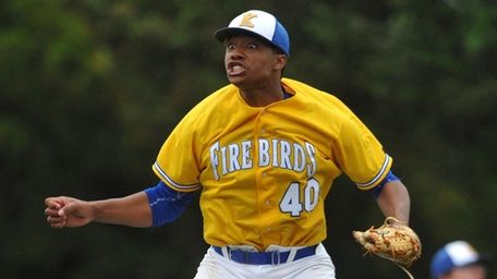 Jason Diaz #40, Kellenberg starting pitcher, reacts after