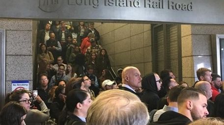 Commuters jam the LIRR station in Jamaica on