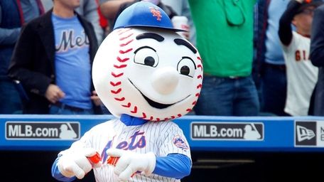 Mets mascot Mr. Met entertains the fans between