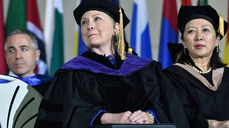 Former Secretary of State Hillary Clinton with faculty