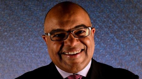 Sportscaster Mike Tirico poses for a portrait during
