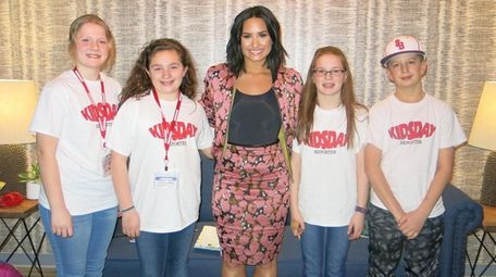 Demi Lovato with Kidsday reporters, from left, Jessica