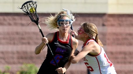 Middle Country's Rachel Masullo, left, is defended by