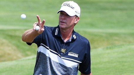 Steve Stricker catches a ball during a practice