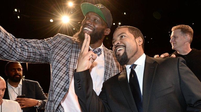 Ice Cube, right, and Reggie Evans at the