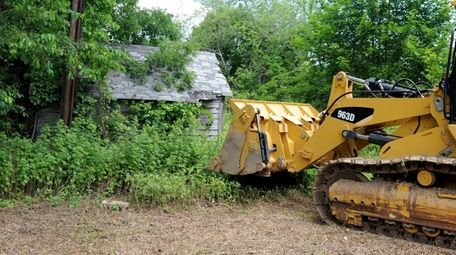 Demolition of old structures begins at the site