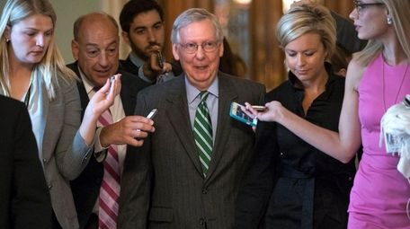 Senate Majority leader Mitch McConnell leaves the chamber