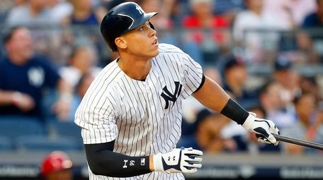 Aaron Judge of the Yankees follows through on a