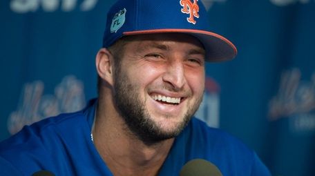 Mets outfielder and former NFL quarterback Tim Tebow
