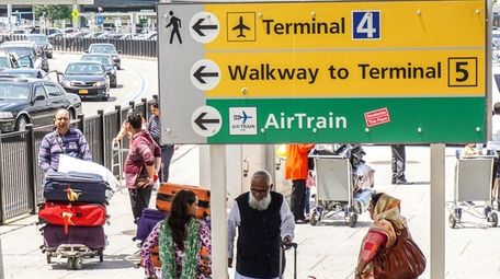 Travelers arrive and depart at Terminal 4 at