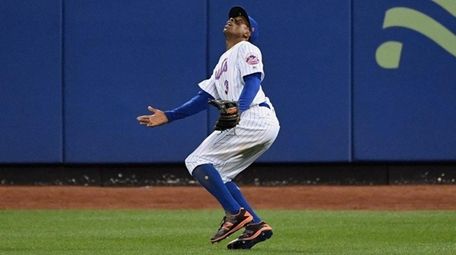 Mets centerfielder Curtis Granderson never saw this fly