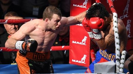 Jeff Horn of Australia and Manny Pacquiao exchange