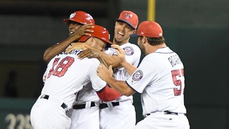 Ryan Raburn, No.18 of the Washington Nationals, celebrates