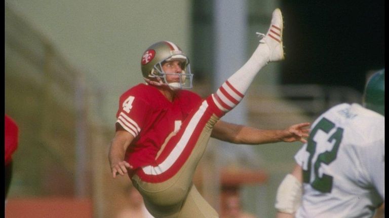Punter Max Runager of the 49ers kicks the