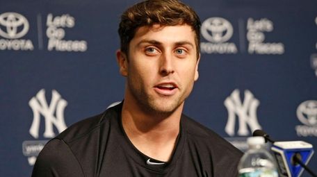 Injured Yankees outfielder Dustin Fowler speaks to the