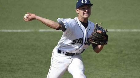 Oceanside High School starting pitcher Kyle Martin delivers