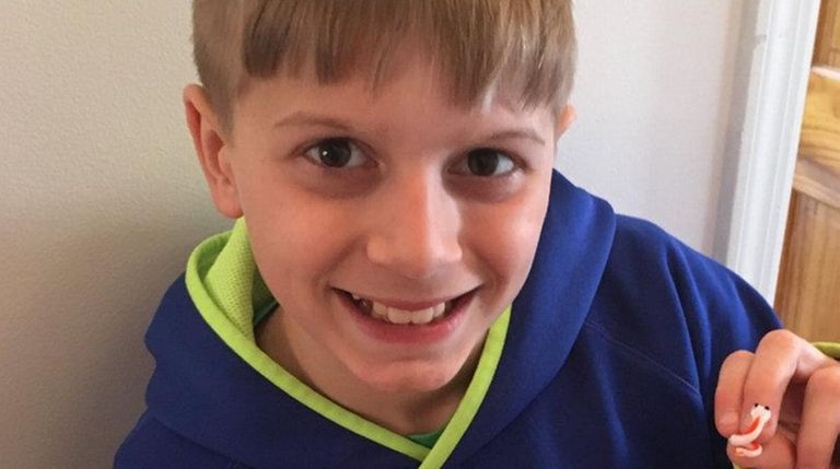 Joey Hayward, 11, of Bethpage, with his glass