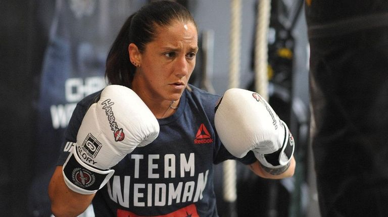 Female mixed martial arts fighter Jennie Nedell trains