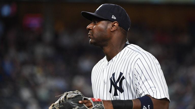 Yankees first baseman Chris Carter looks on against