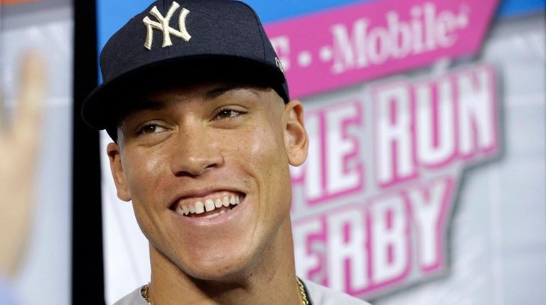 Yankees rookie Aaron Judge talks during media availability before the